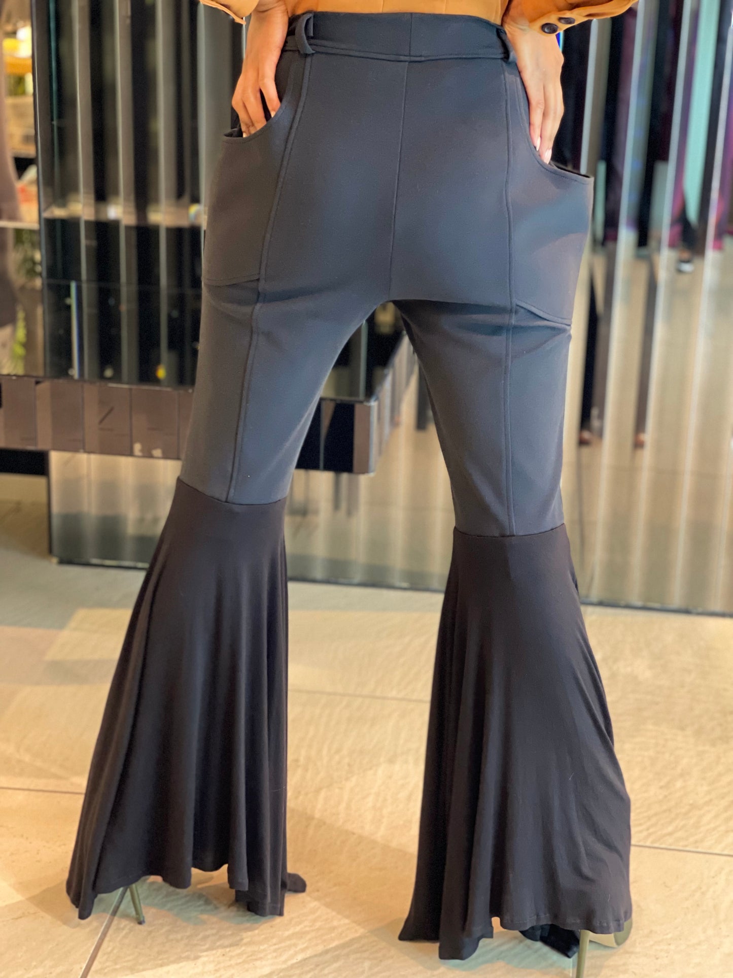 High Waist Plunge Pocket Flared Trousers.