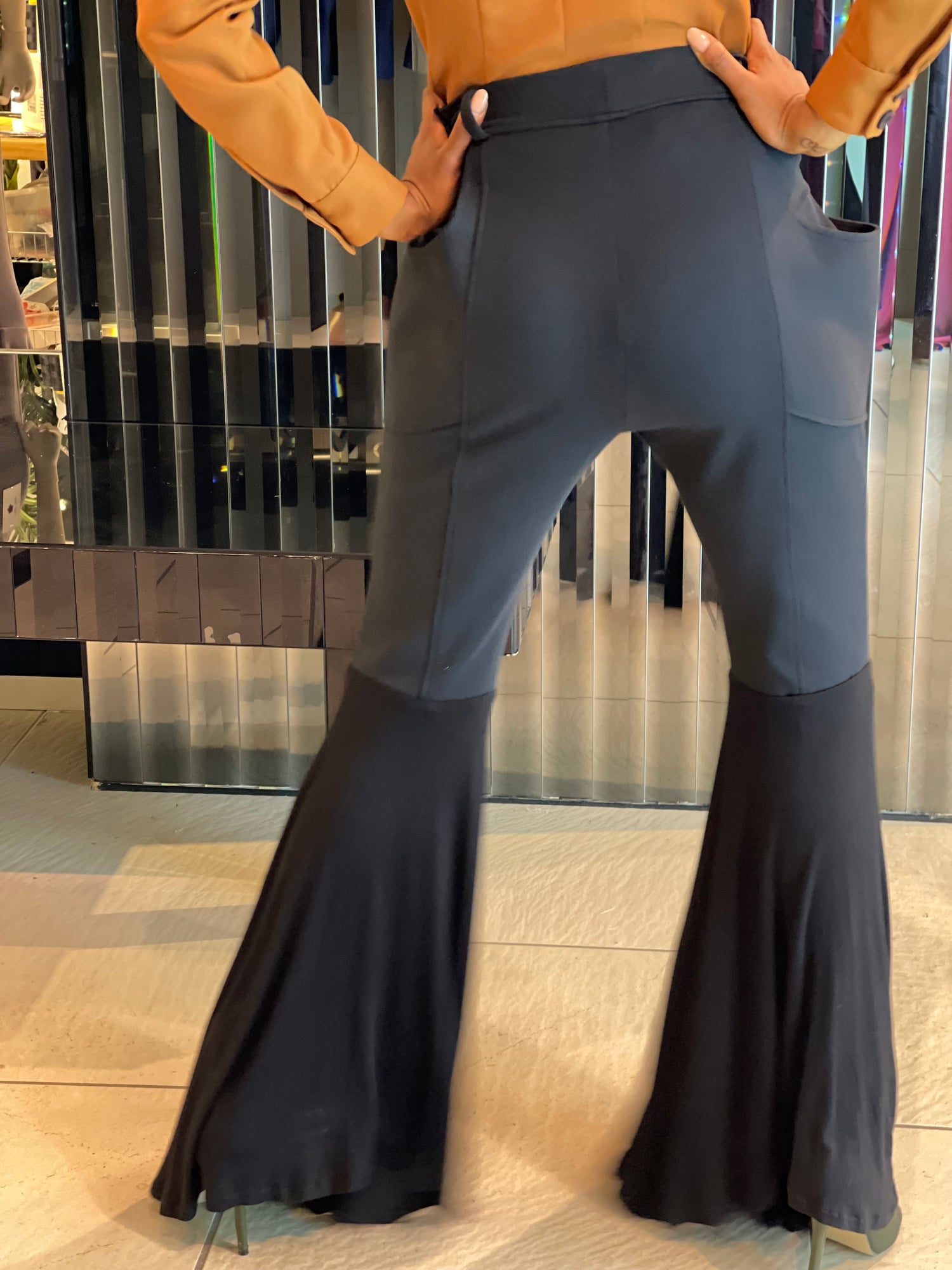 High Waist Plunge Pocket Flared Trousers.