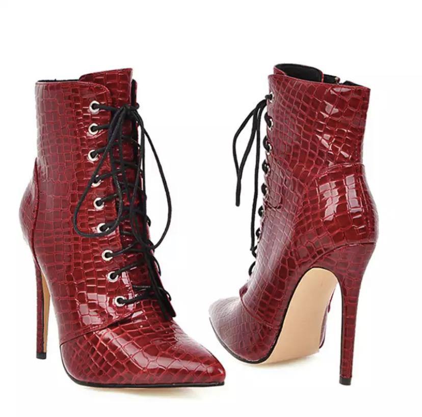 Lace Up High Heel Snake Boots.